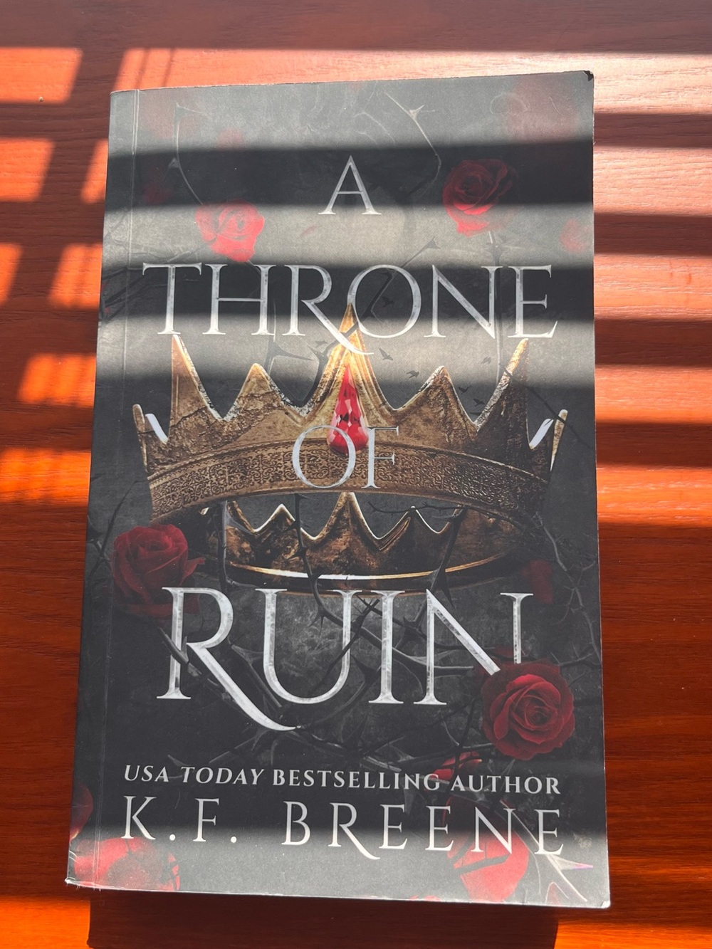 A Throne of Ruin by K.F. Breene - Black & Red Paperback